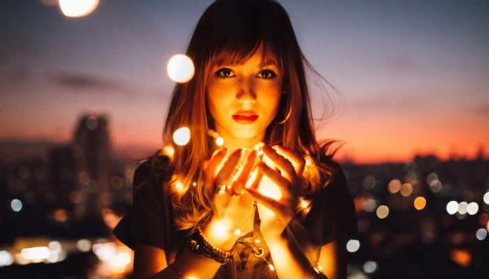 https://www.pexels.com/photo/woman-holding-fireflies-573299/